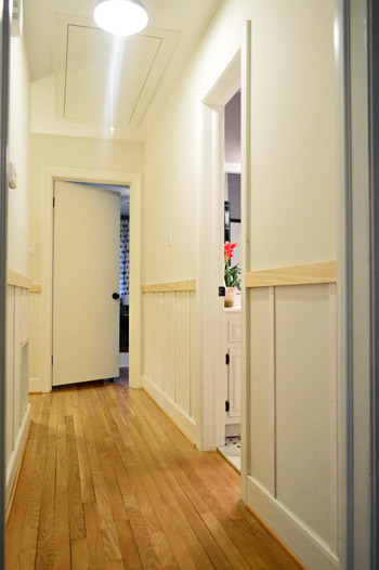 progress on DIY board & batten project with vertical battens installed in hallway