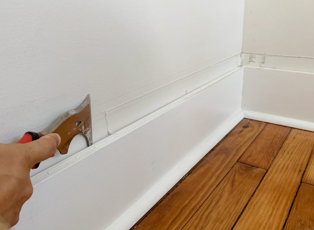 Scraping Old Caulk For Smooth Wall Above Baseboard