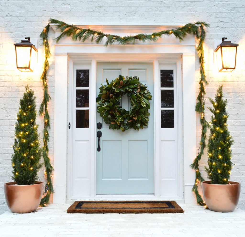 Glossy front door with christmas decorations tranquility benjamin moore