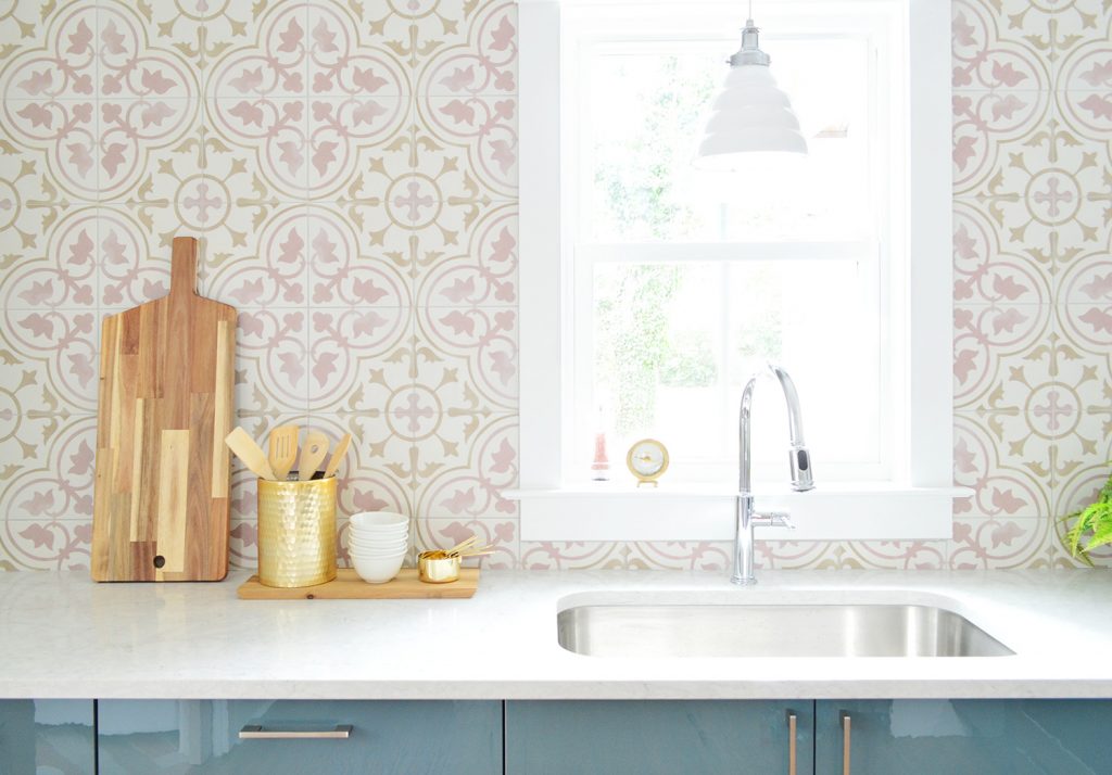 Pink Patterned Tile Backsplash With White Counters
