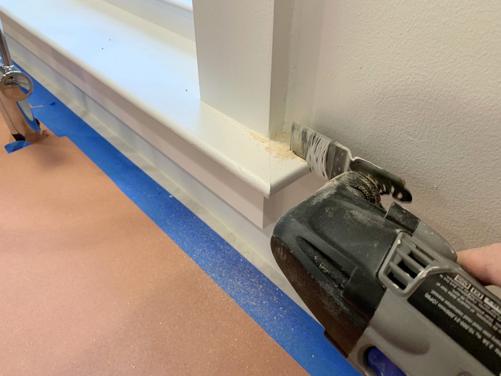 Trimming Window Molding With Dremel Before Backsplash Install