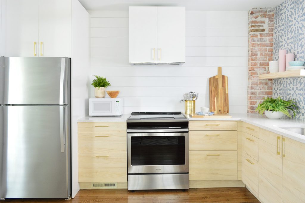 White Planked Wall In Duplex Kitchen With Wood Shelves