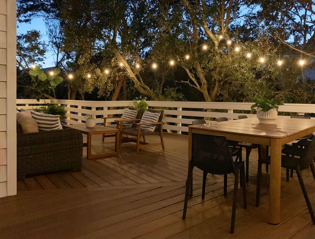 Nighttime View Of Large Deck With String Lights