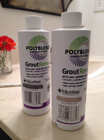 two bottles of Polyblend Grout Renew from Home Depot in Natural Gray and Oyster Gray colors
