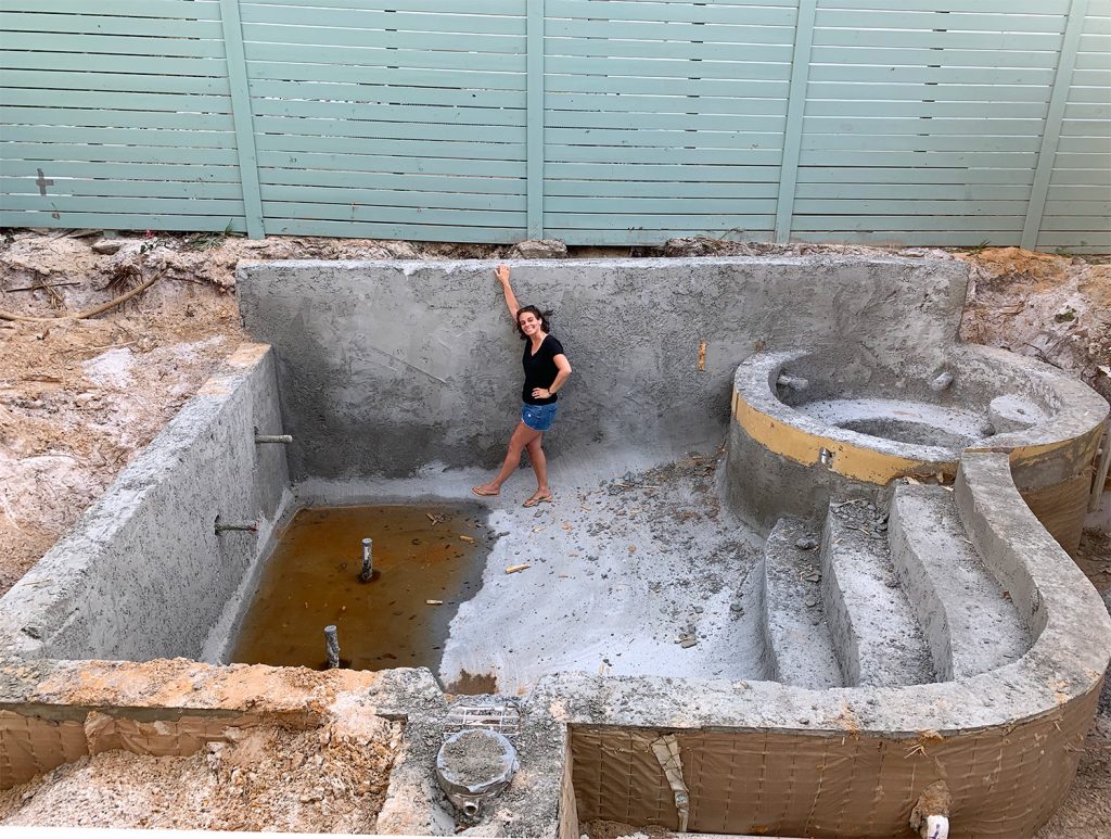 Sherry standing in concrete pool form