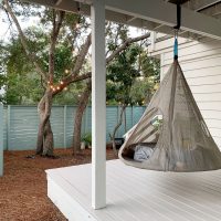 Updating A Covered Porch With Floor Paint & A Hanging Tent
